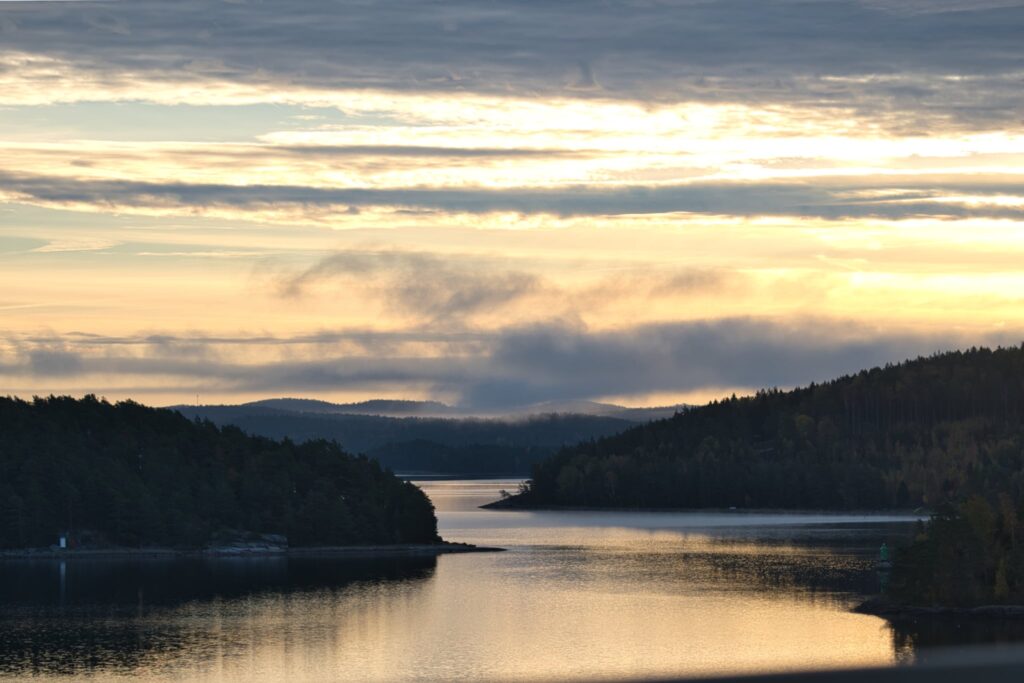 Heaven is here – peaceful lake with mist and morning light.
