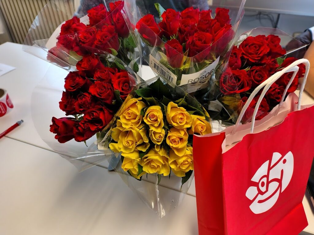 Flowers on the table before going door to door talking about democracy and voting.